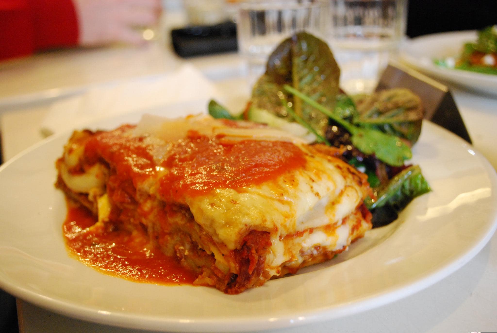 Picture of a plate full of lasagna